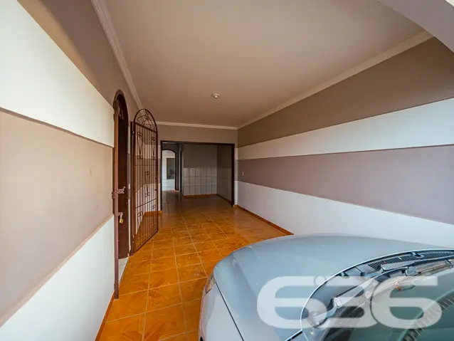 Encantadora Residência Térrea de 3 Quartos no Bair